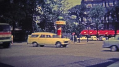 1969: Touring Amsterdam's Landmarks with Busy Traffic Streets