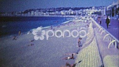 1969: South of France beach scene young people having fun.