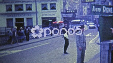 1969: French police direct traffic in the street with help of military.