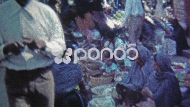 1974: Outdoor food market selling peppers,tomatoes and melons.