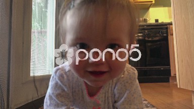 Cute crawling baby girl coming for you.