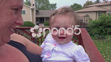 Mom and baby suburban desk outdoor time.
