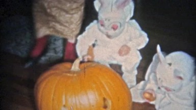 Boulder, Colorado (1951): Creepy Halloween kids bunny costumes.