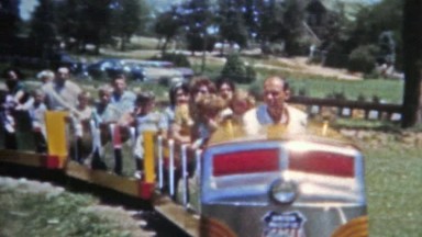 Denver, Colorado (1951): Family riding Elitch Gardens classic train ride