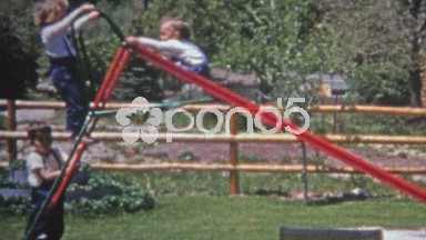 Boulder, Colorado (1952): Toddler sliding backwards down steep residential home