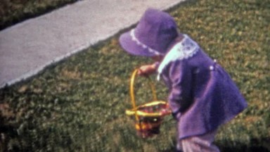 Boulder, Colorado (1952): Outdoor Easter egg hunt in formal fashion dress bonnets.