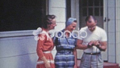 1953: Family laughing about advnaced photography technology.