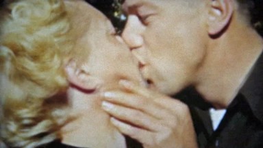 1953: Bleach Blonde 1950s Sass Kissing Her Man