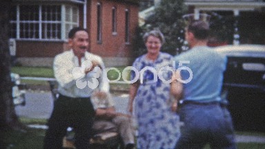 1953: Brothers play fighting for parents attention, Dad joins in.