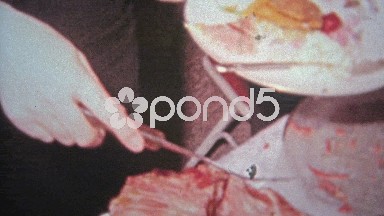 1957: Christmas Celebration Complete with Ham and Crowd Pan.