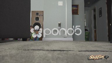 Denver, Colorado, United States: Sneaky Baby Hiding Behind Couch Comes Out To Play.
