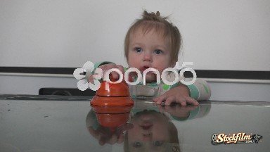 Denver, Colorado, United States: Baby Ringing Toy Bell Then Eating It.