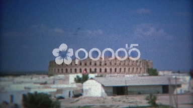 1972: Roman-like Colosseum Ruins Tour at Archaeological Historic Site in Tunis