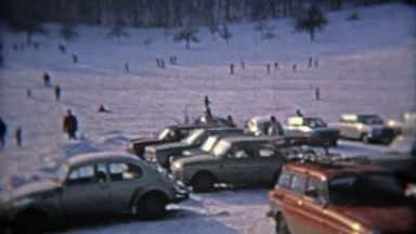 1975: Drive up ski resort right next to road, parking on slopes.