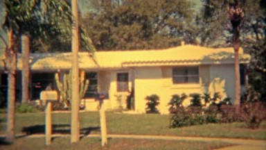 1975: Modest Arizona home with big cactus in front yard.