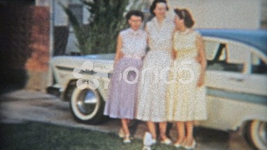 1957: 3 sisters showing off famous 57' Plymouth brand new car.