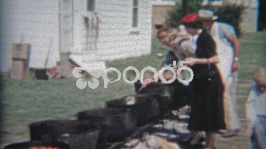 1957: Boiling pots cooking Texas style food for huge party.