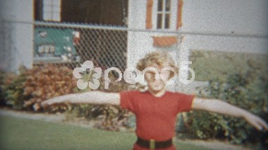 1953: Girl practicing fancy ballet dancing moves.