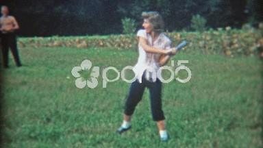 1948: Woman with Powerful Baseball Swing Plays with Boys in Dayton Park