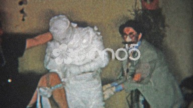 1956: Mummy halloween costume and other old timey costumes.