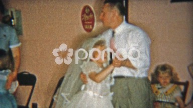 1955: Dad dancing with daughter in basement during 1st communion party.