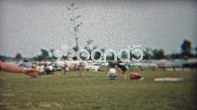 1956: Shirtless Man Shows Off Baseball Swing Skills in Flint, Michigan