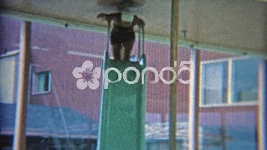 1964: Hilarious Indoor Pool Slide Reaching Top of Motel Ceiling