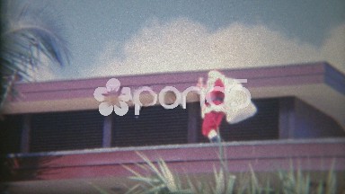 1956: Santa Walking on Roof with Bag Full of Gifts to Drop