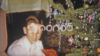 1954: Happy boy gets baseball glove for Christmas gift.