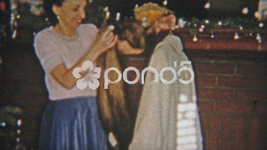 1954: Woman Tries On Mink Fur Stole as Christmas Gift