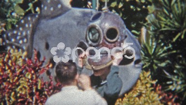 Brothers Trying on Old Underwater Divers Helmet