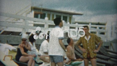 1959: Family hanging out at claimed beach lounge chairs spot.