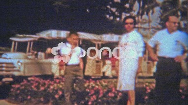 1962: Family Waiting for People Mover Train at Miami Resort Hotel