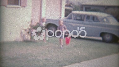 1963: Easter egg hunt boys search and destroy business like style.