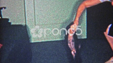 1957: Teaching Pet Monkey to Hold Hands and Walk Indoors.