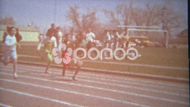 1963: Children running track race using informal clothing