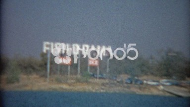1964: Fish-O-Rama bait tackle store riverside boat garages