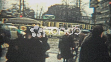 1966: Crowded Urban European Scene of People Walking Past Mass Transit Trains