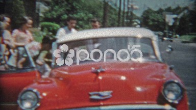 1953: Family Checking Out New Red 53' Chevy Car Packing Up and Driving Away.