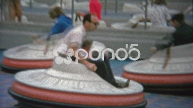 1962: Disneyland flying saucers bumper car amusement park ride.