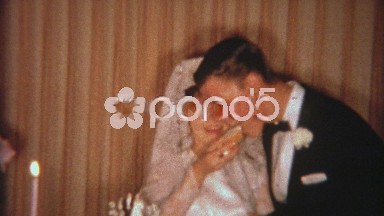 1966: Bride feeds groom cake and says no to a messy cake exchange gag.