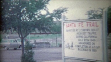 1966: Santa Fe Trail wayside with family truckster station wagon road trip.