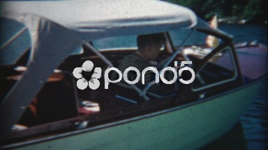 1960: Kids get to drive family boat for first time.