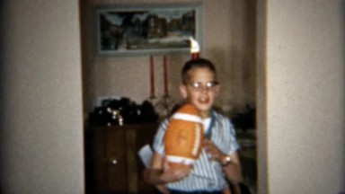 1957: Christmas gathering of the perfect idyllic American football family.