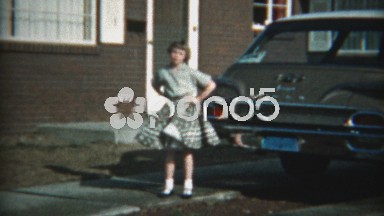 1961: Girl in Polka Dot Skirt Opening Ford Station Wagon in Denver