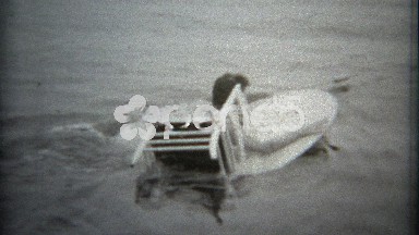 1960: Women Trick Waterskiing with a Stunt Table and Circus Chair.