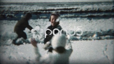 1961: Children Having Snowball Fight in Winter Sunshine as Snow Melts