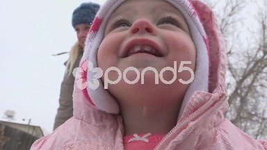 Baby girl closeup winter snowflakes 2 front teeth for Christmas