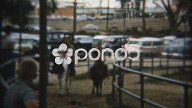 1959: Kid's pony ride at popular amusement park.