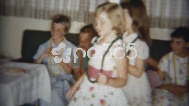 1958: Kids wearing Hawaiian style Lei necklace party.